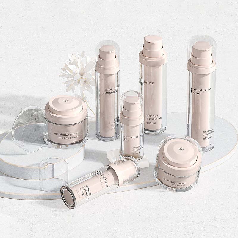 Close‑up of gradient color finish on empty airless pump skincare bottle