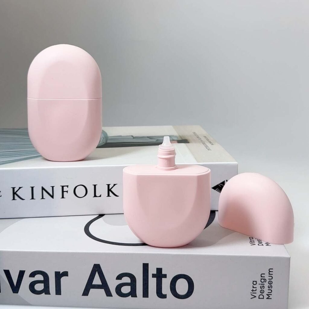 Oval sunscreen bottle packaging with ergonomic design for skincare brands