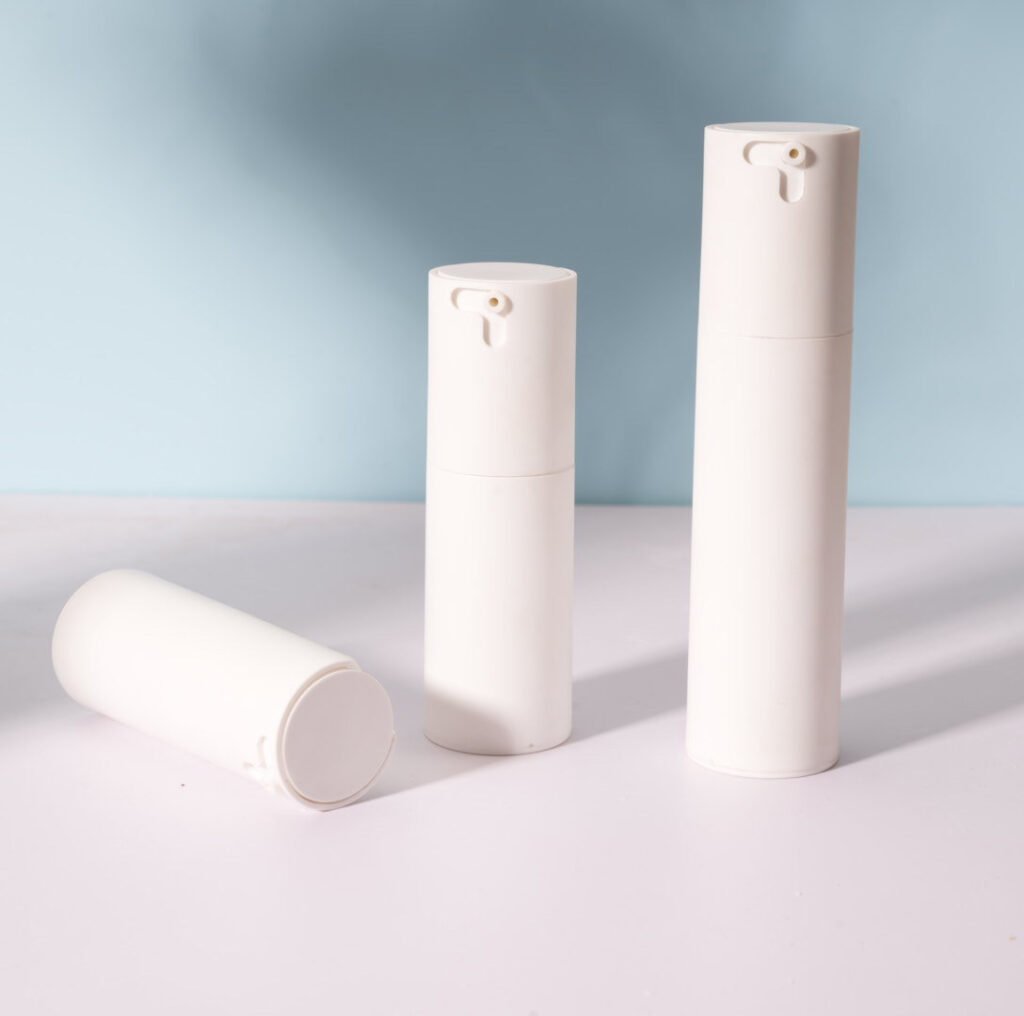 White classic airless pump bottle nozzle tip detail, cosmetic packaging